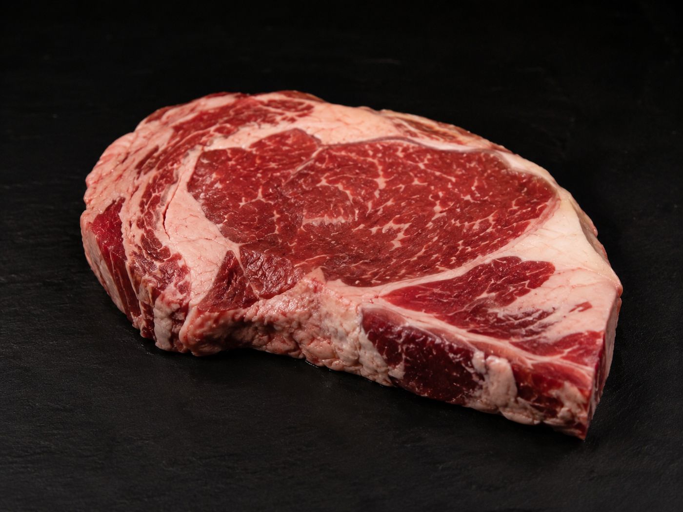 Black Angus ribeye marbling close-up